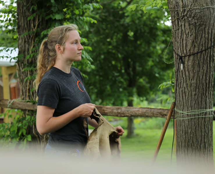 Christine McGuigan holding leather