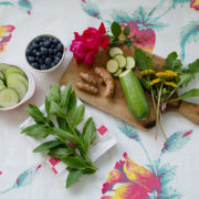 Plants, fruits, and vegetables on a table
