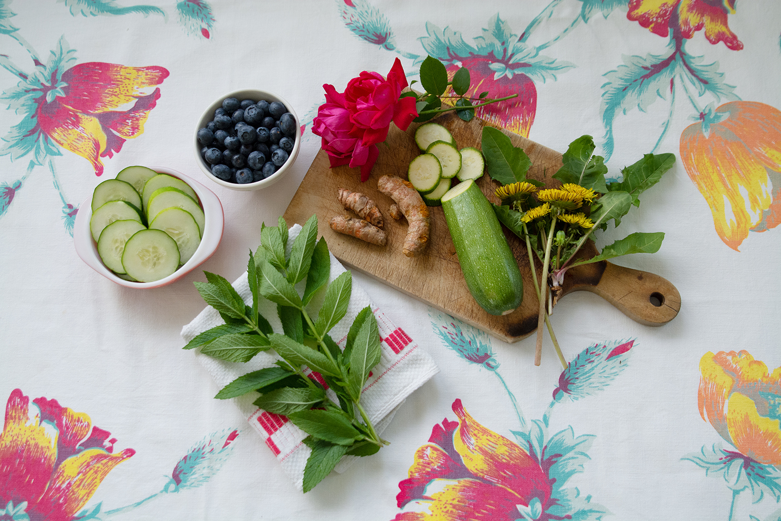 Plants, fruits, and vegetables on a table