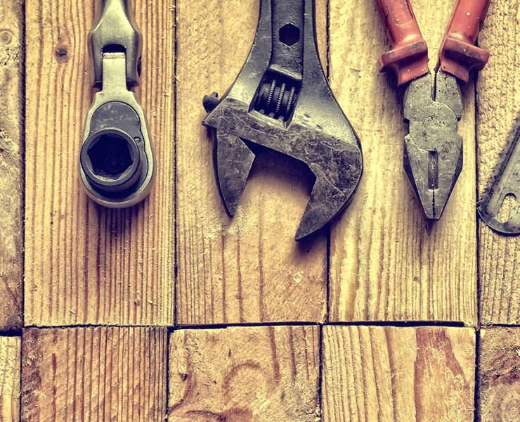 tools on a wood background