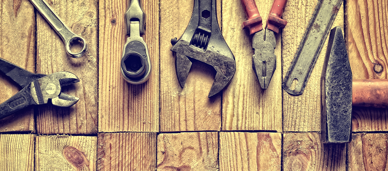 tools on a wood background